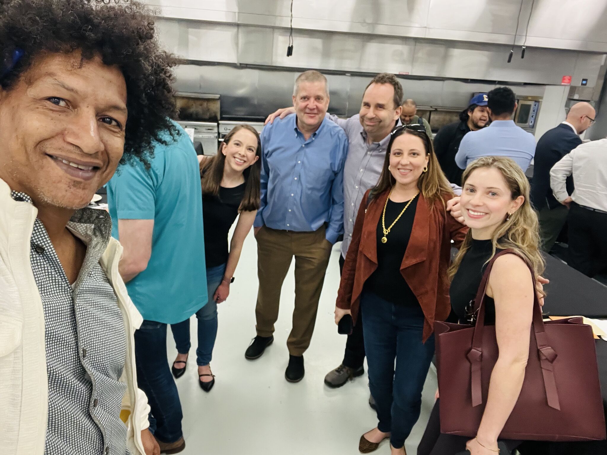 LaRon Batchelor with a product team in a commercial kitchen