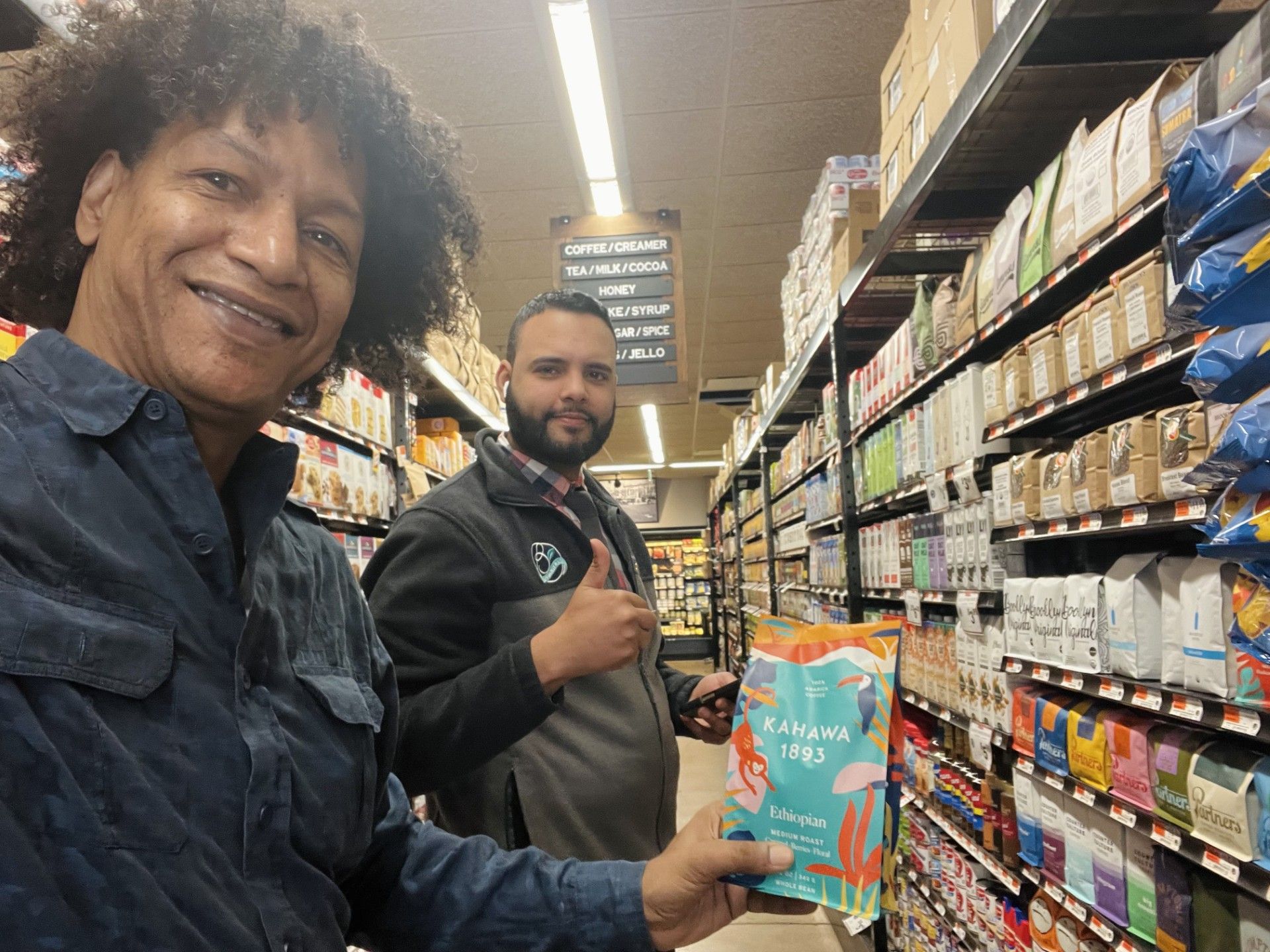 LaRon Batchelor selecting coffee on a retail shelf